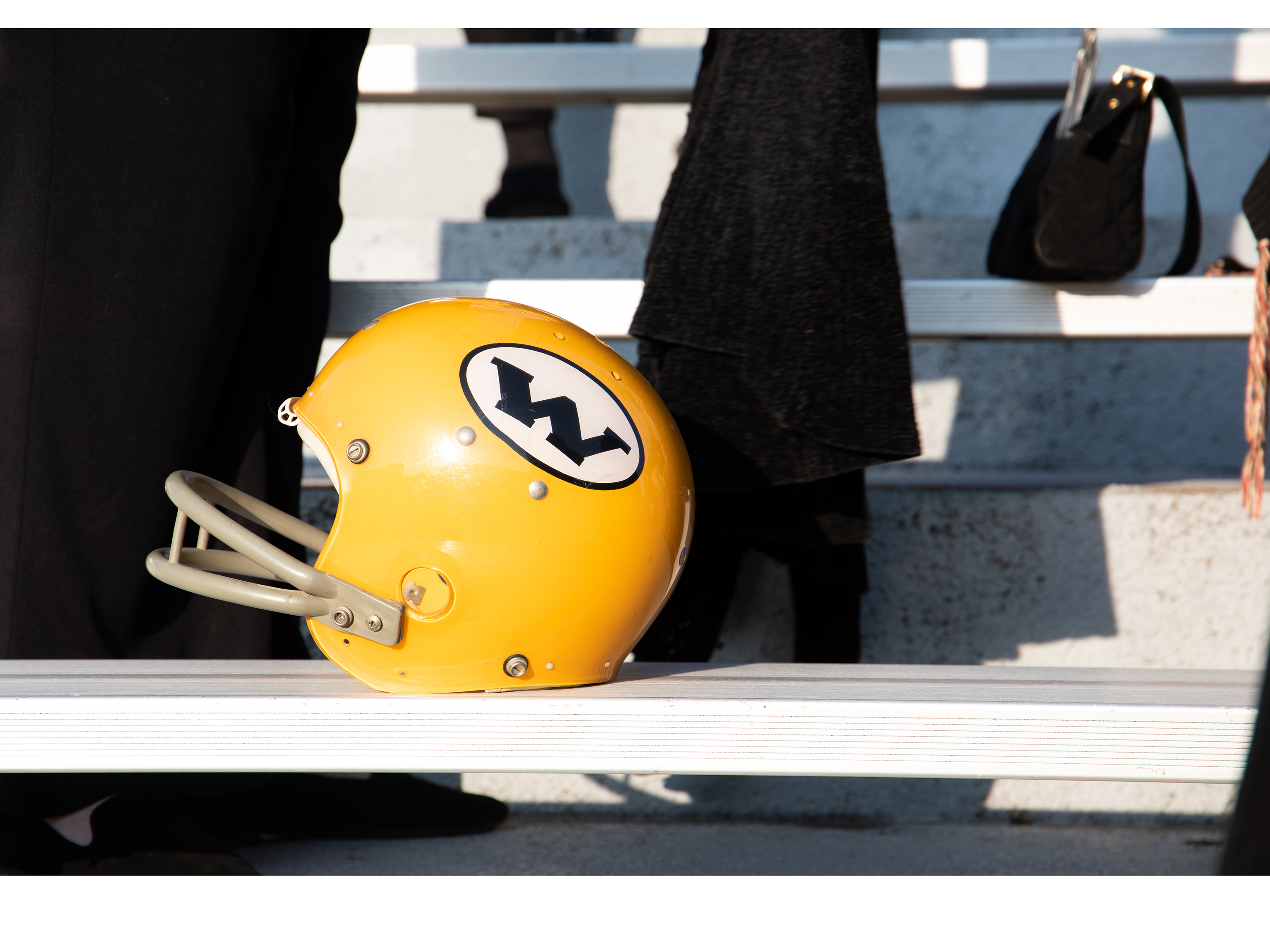 A Wichita State football helmet sits atop a bleacher in Cessna Stadium at the 50th Observance of Memorial '70