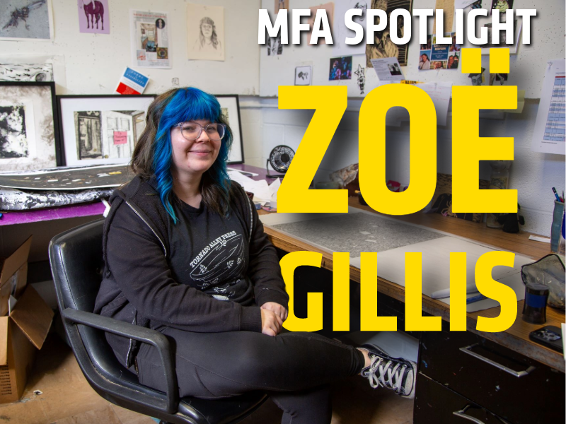 MFA student Zoë Gillis sits in a desk chair in her McKnight Art Center studio surrounded by prints.