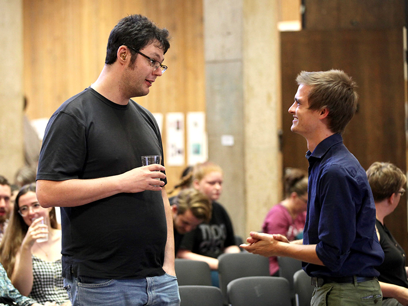 Creative Writing students converse at an event hosted at McKnight Art Center