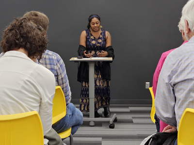 Zariah at a poetry reading in the lab Zariah at a poetry reading in the lab