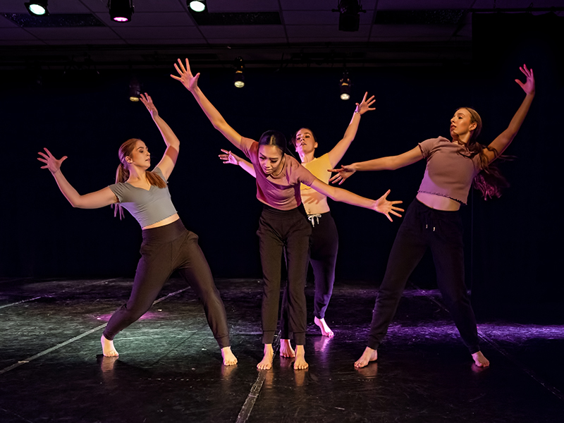 Dance students practicing on stage