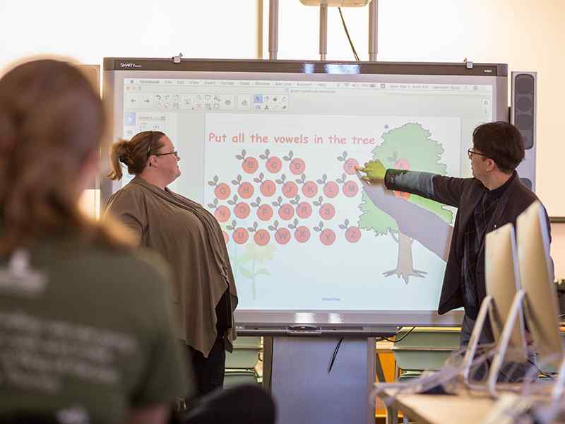 Applied Studies students demo presentation technology in a classroom setting