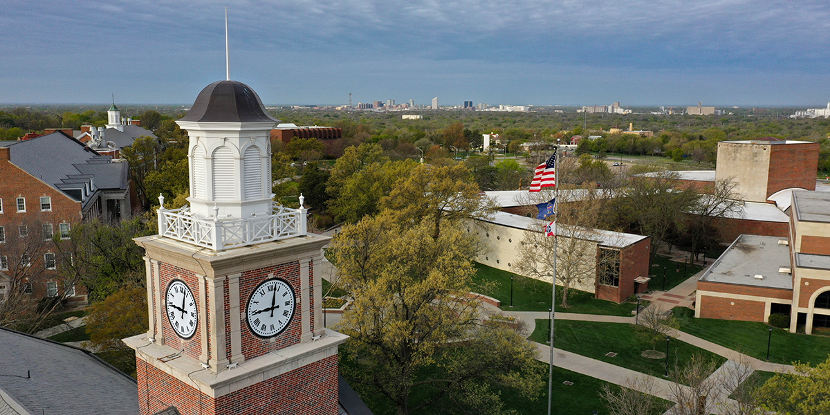 View of campus and Wichita's downtown skyline from the clock tower of Morrison Hall