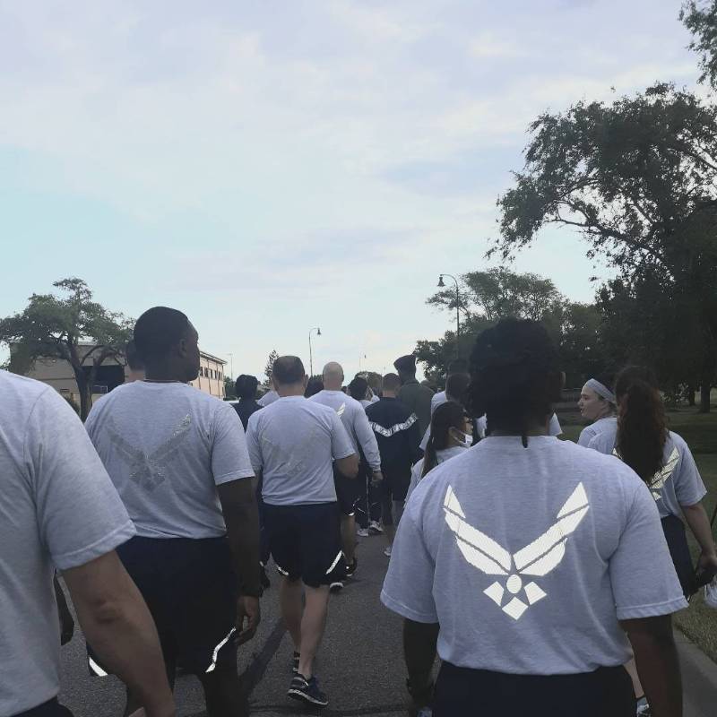 people walking in a unity walk on an air force base