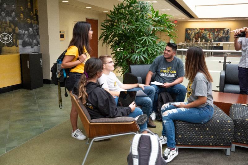 students gathering in the rhatigan student center