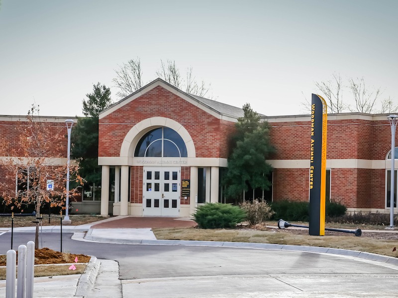 Photo of Woodman Alumni Center.