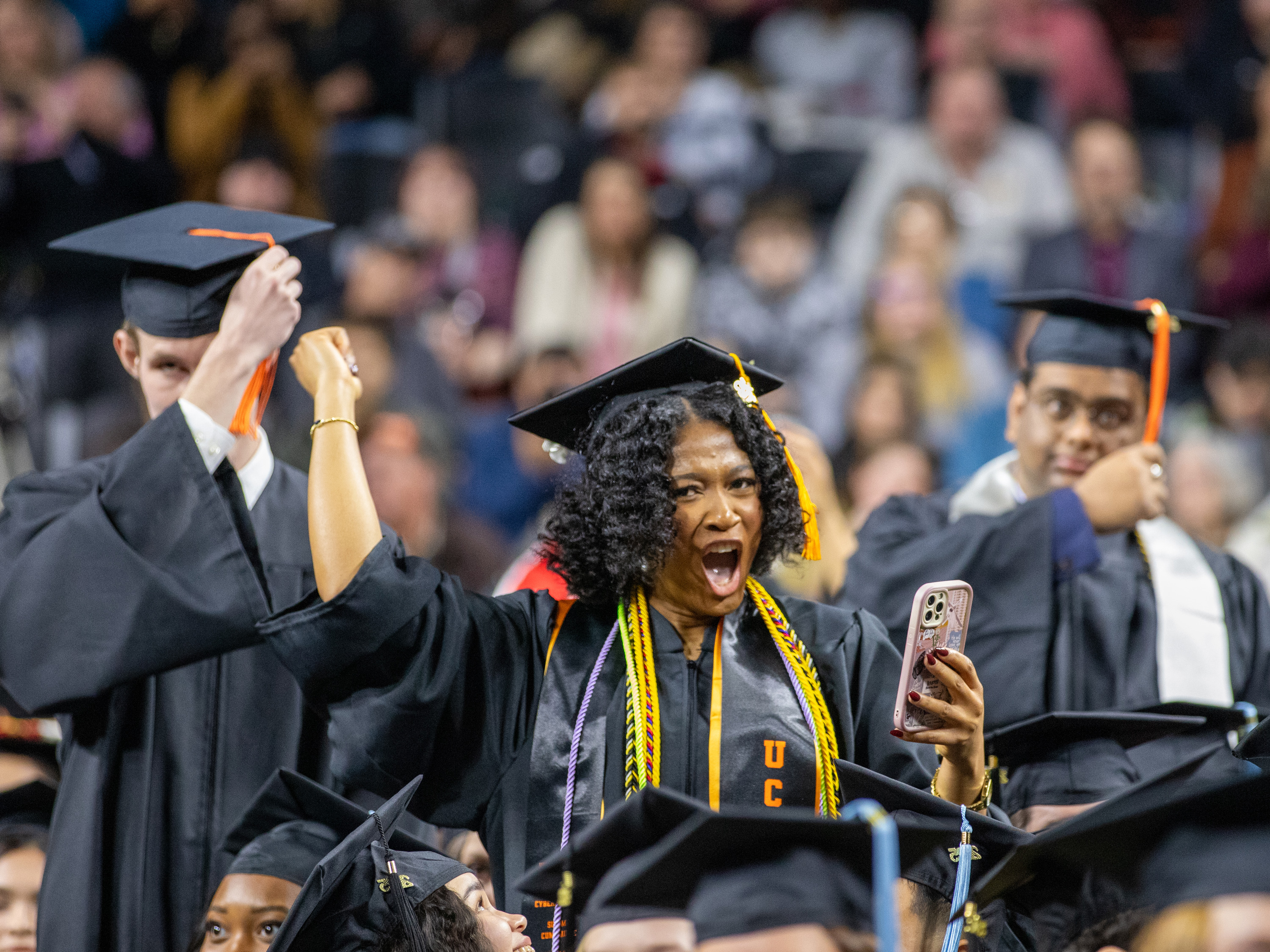 2025 Graduate waving