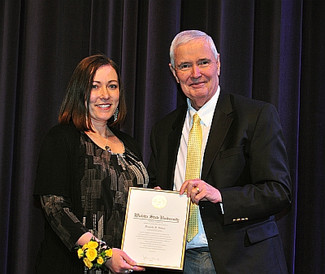 Danielle Gabor receiving the President's Distinguished Service Award from President Bardo on April 30, 2014. 