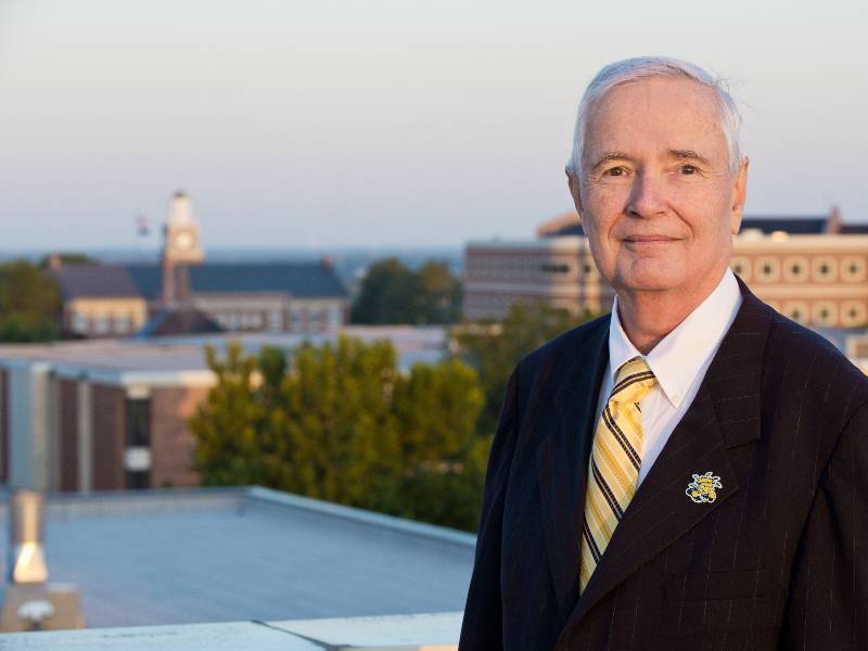 John Bardo with campus in the background