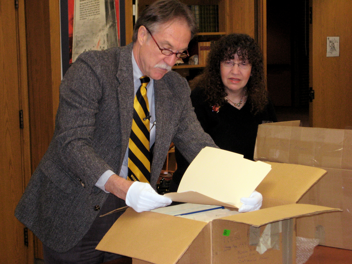 Ted Ayres and Lorraine Madway helped open boxes of Gordon Parks Papers on Friday, Feb. 22.