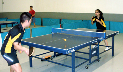 PJ Phachantry (left) and Luwen Zhang practice at the Wichita Table Tennis Center. The two are members of the Wichita State table tennis team that won its division title for the third straight year. The team will represent WSU in the College Table Tennis Association National Championships from April 15-17 in Rochester, Minn.