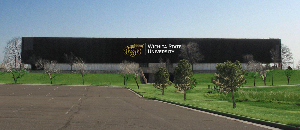 The former Kansas Coliseum with what will eventually be the WSU sign on the side.