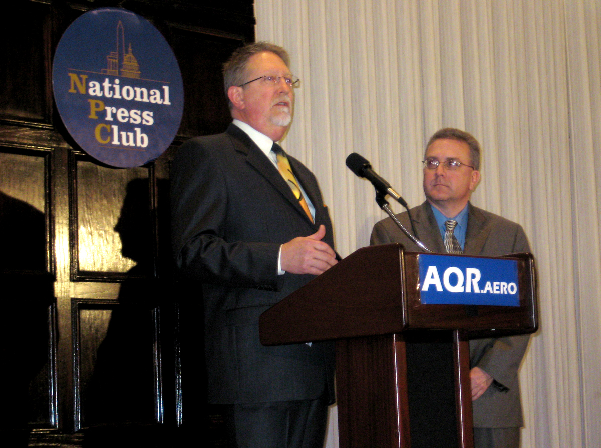 Wichita State University's Dean Headley, left, and Brent Bowen with the University of Nebraska at Omaha, authors of the Airline Quality Rating, hold a news conference Monday, April 7, in Washington, D.C., to announce the results of the AQR.