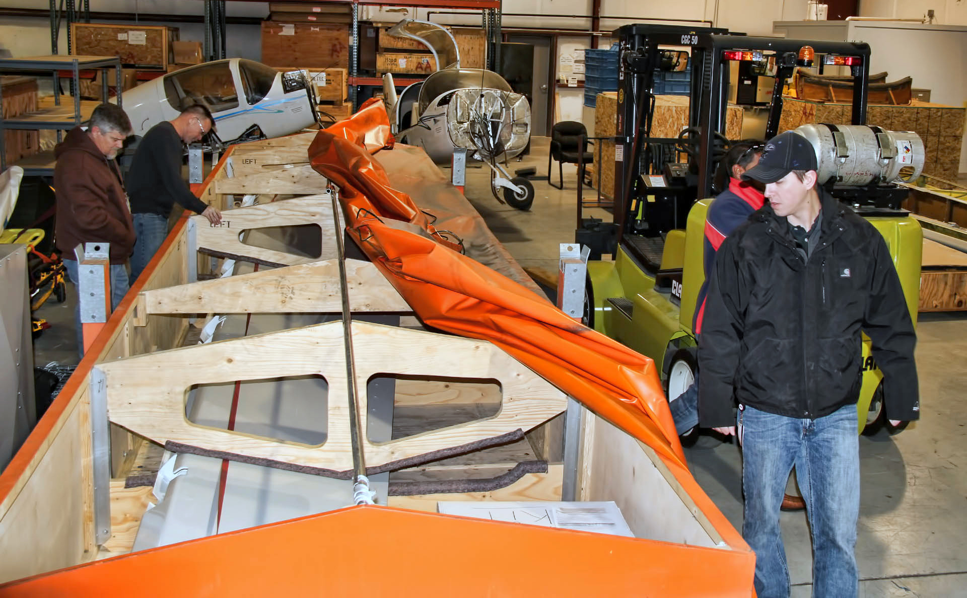 Parts donated to WSU by Airbus are inspected upon arrival.