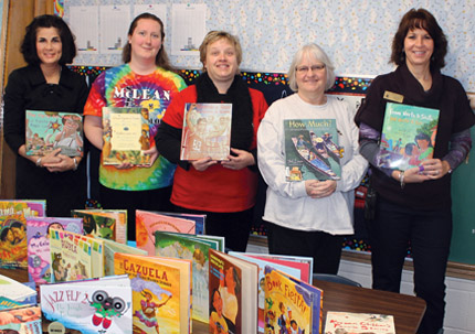 Wichita State's College of Education awarded assistant professor Gayla Lohfink with a research grant that provided McLean Science and Technology Magnet Elementary with new multicultural books.