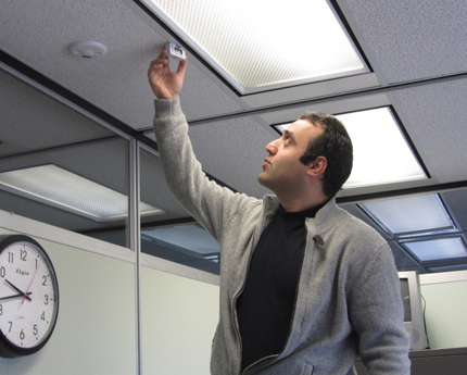 A WSU engineering team analyzed results for Wichita City Hall's automatic light sensors. Pictured is graduate student Amin Esmaelli.