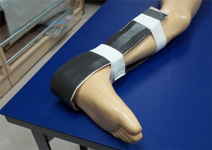 A prototype of a rapid setting composite splint that could be used to help stabilize injuries in the battlefield and in everyday life.