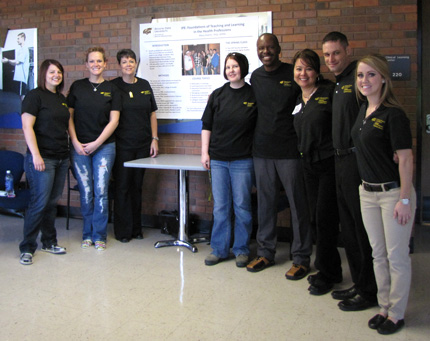 Students from the School of Nursing, Aging Studies/Public Health Sciences Department, Physical Therapy Department and the Biology department participate an IPE poster session.