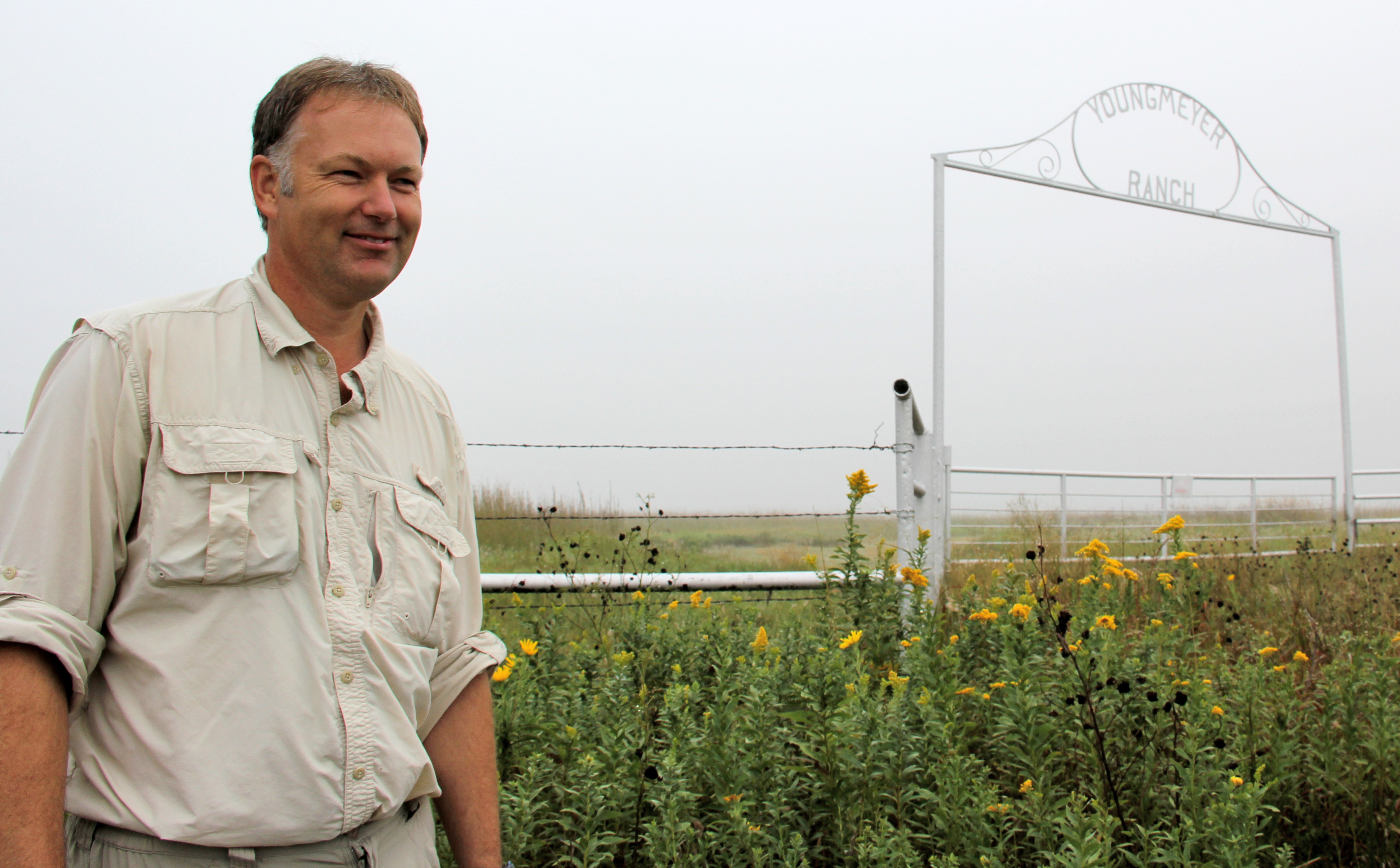 Greg Houseman, associate biology professor, surveys the land gifted to WSU for new research.