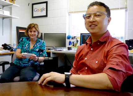 Wichita State's Barb Chaparro, left, and Jibo He have collaborated to create software that could improve the usability of mobile devices.