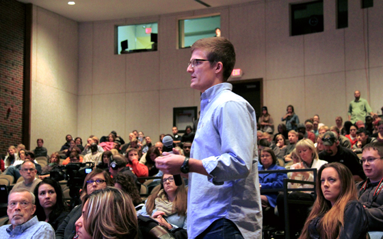 A Wichita State student asks a question during Tuesday's open safety forum hosted by WSU.