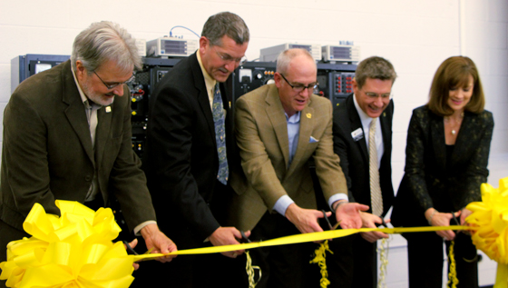 Westar Energy lab dedication ribbon-cutting. From left: Ward Jewell, WSU professor of electrical engineering; Kelly Harrison, Westar vice president of transmission; Mark Ruelle, Westar president and CEO; Royce Bowden, WSU dean of the College of Engineering; and Elizabeth King, WSU Foundation president and CEO.