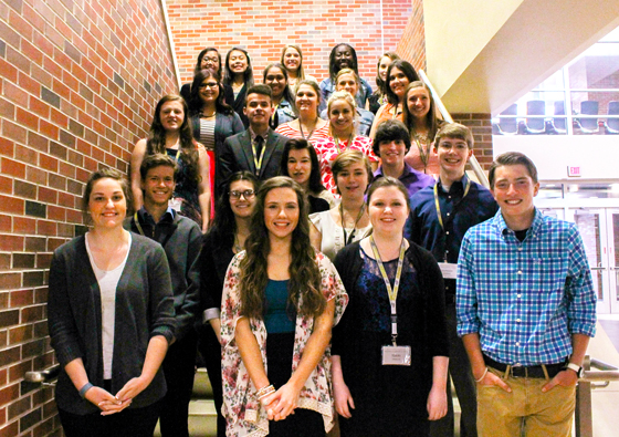 Graduates of the Shocker Leadership Academy program pose for a group photos.  The program aids students in building their leadership skills by learning from community leaders, as well as each other.