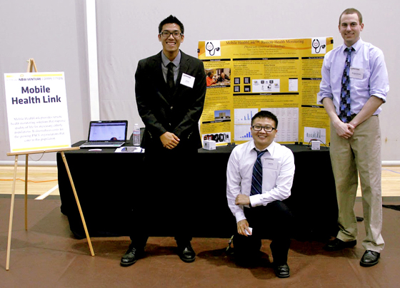 Students Linh Vu, Travis Vo and Brandon Bartlett, shown here during the Shocker New Venture Competitioin, were awarded $600 through the WSU Ventures Innovation Fund Award for their Wearable Remote Health Monitoring technology.