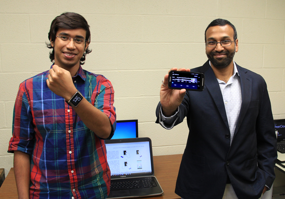 Grad student Anindya Maiti, left, and assistant professor Murtuza Jadliwala are working together with other students and professors on a project studying the security of wearable devices. The project is funded by the National Science Foundation.