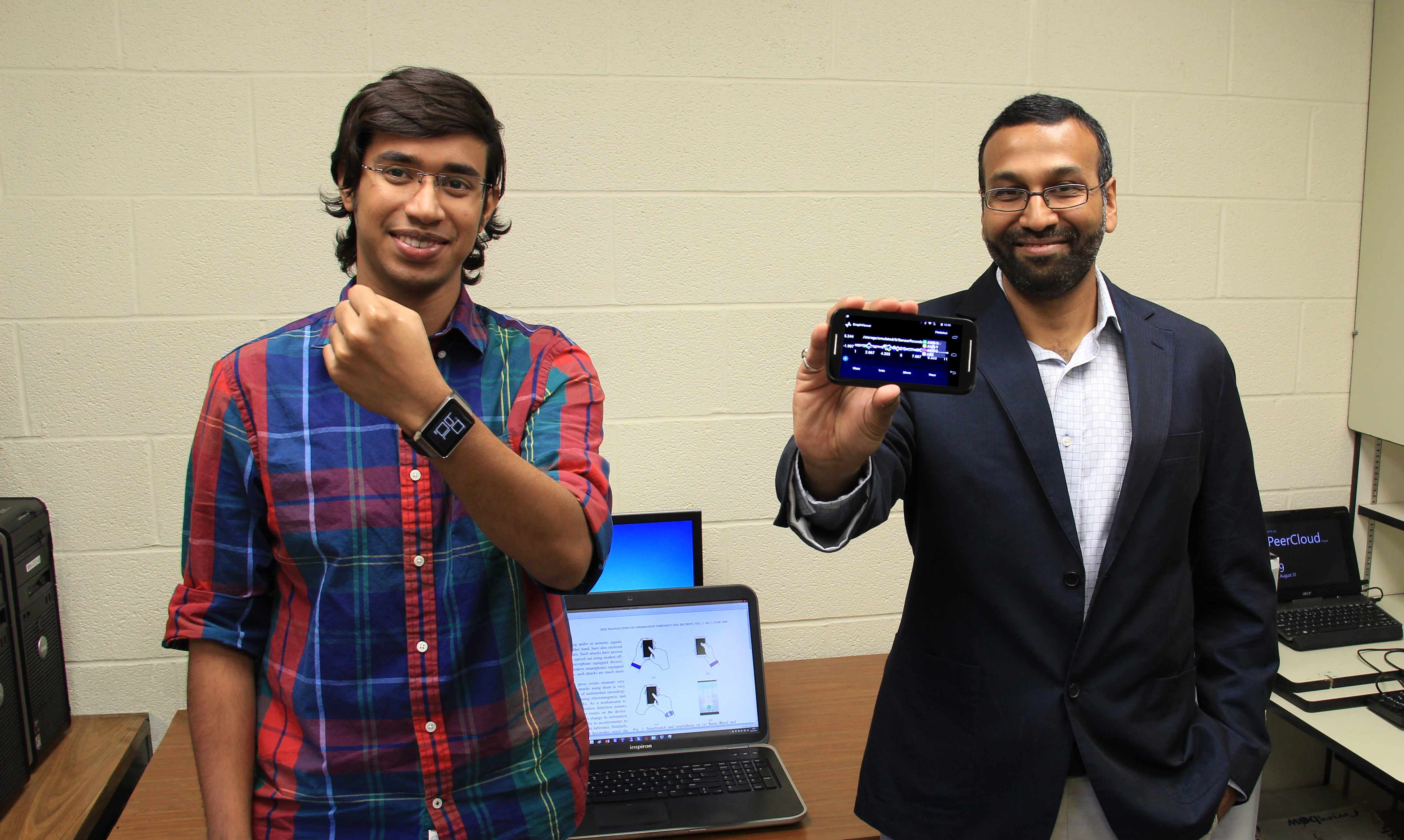 Wichita State grad student Anindya Maiti, left, and assistant professor Murtuza Jadliwala.