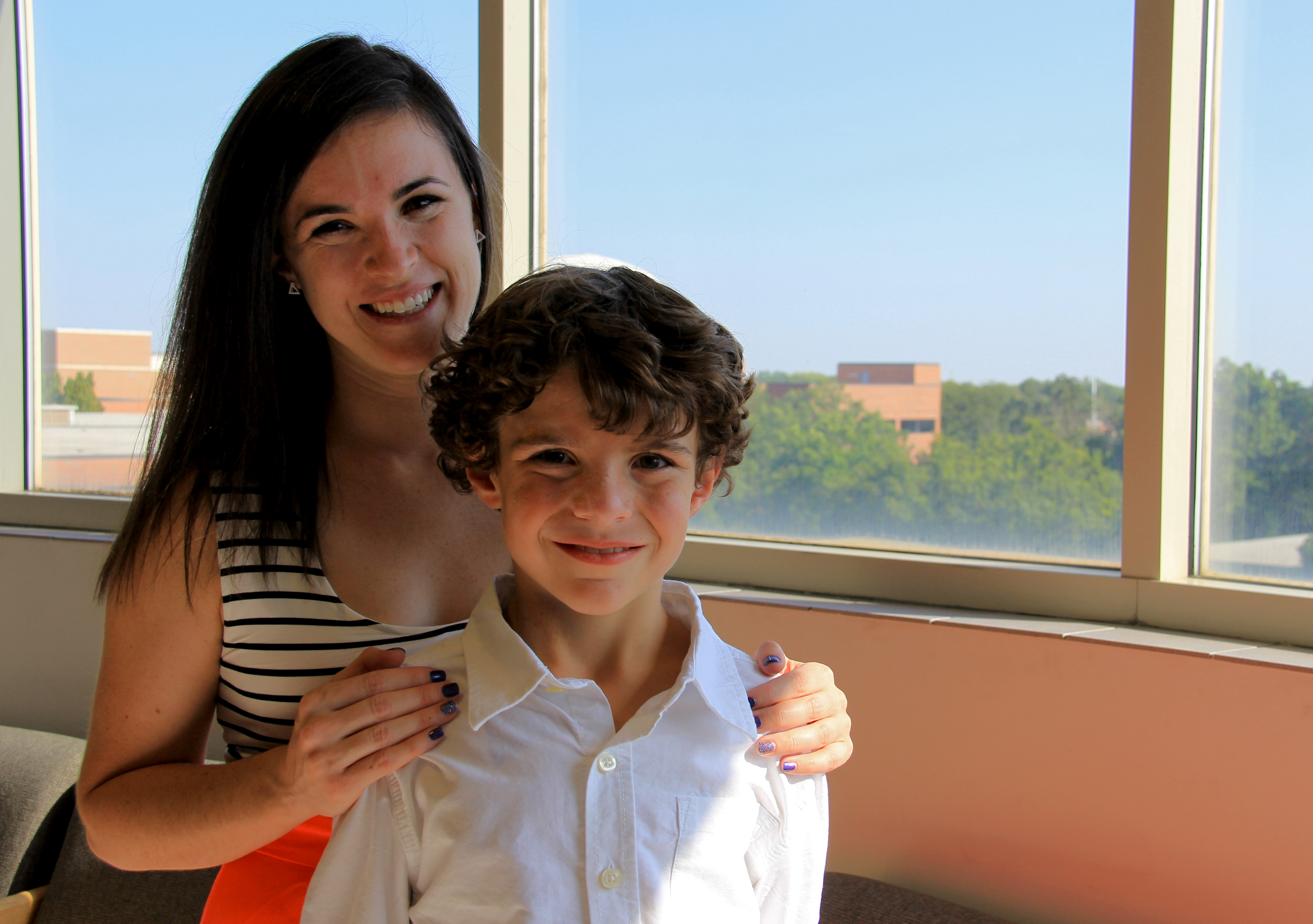 Wichita State grad student Sarah Fouquet with son Noah.