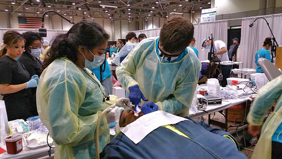 WSU dental program volunteers at Kansas Mission of Mercy dental clinic.