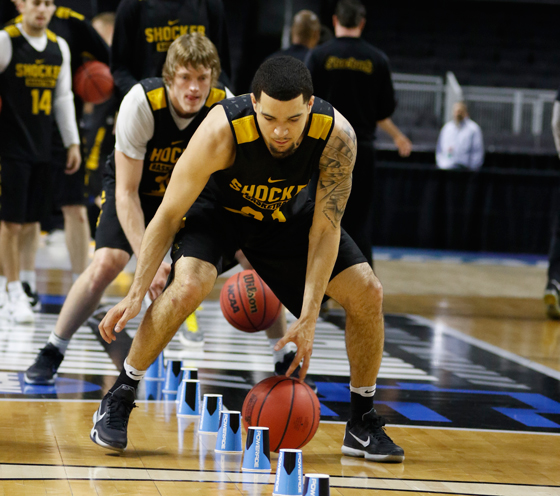 Fred VanVleet and Ron Baker practice Wednesday in preparation for tonight's NCAA Tournament game against 6th-seeded Arizona.