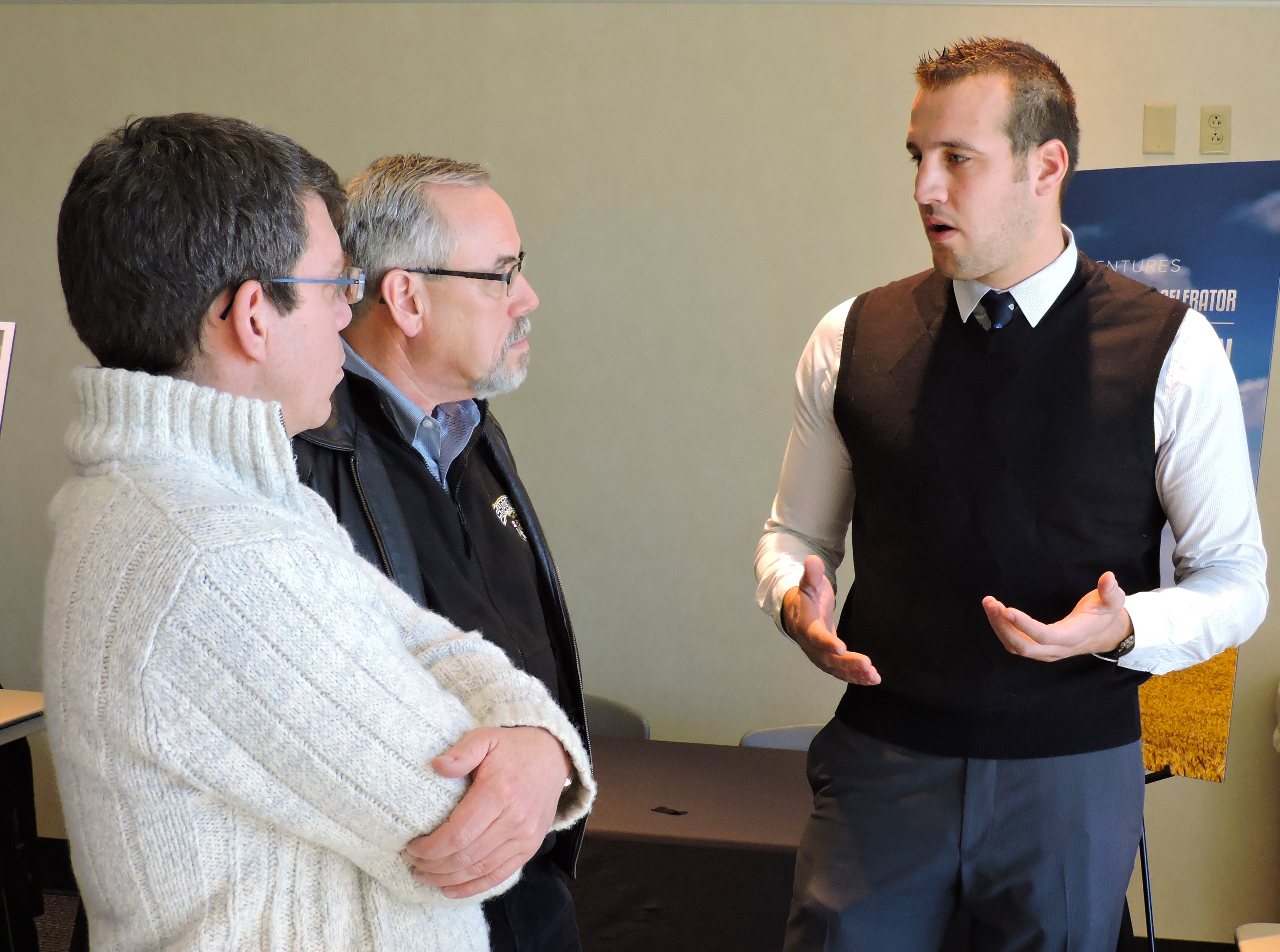 Wichita State University graduate student Georg Schirmer, right, founded Goodflight LLC to commercialize a product to aid pilot training.