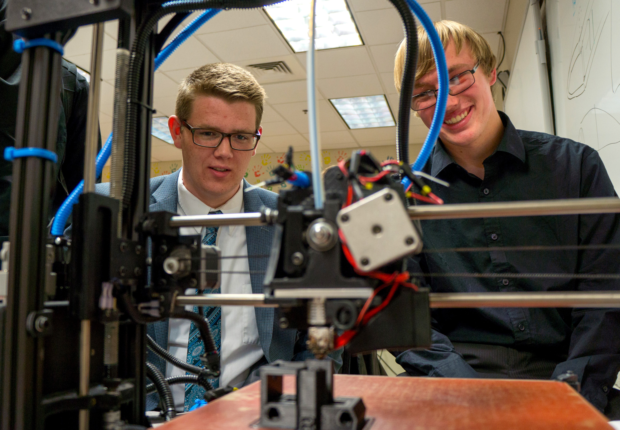 Andover Central High School students with a 3D drone design.