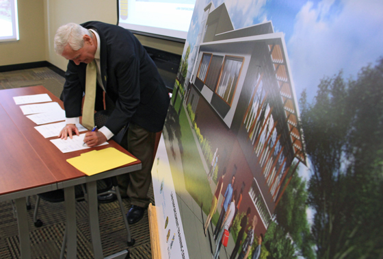 WSU President John Bardo signed off on an agreement to build a Law Enforcement Training Center on the WSU Innovation Campus.