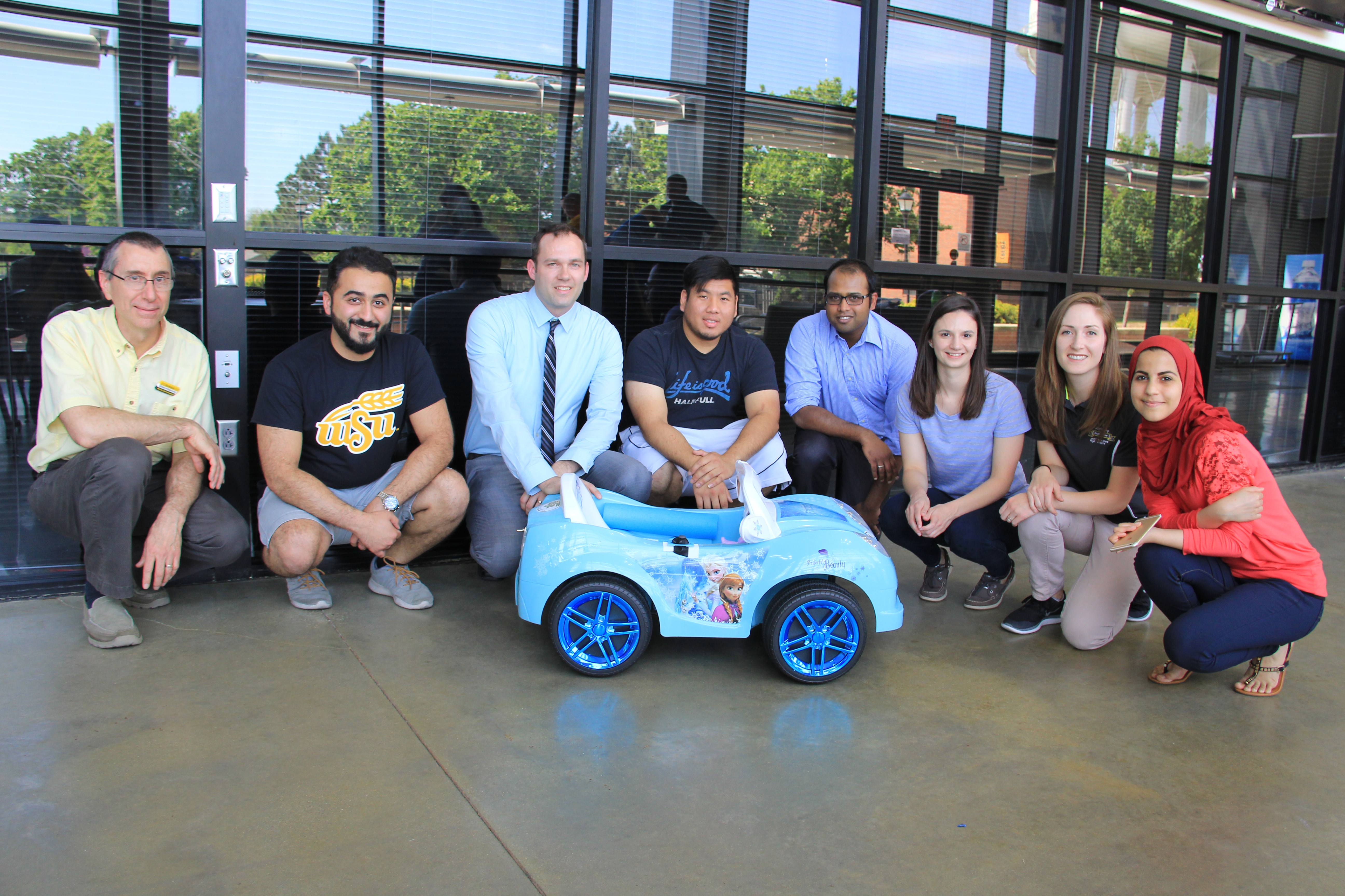 Students, faculty and staff from Wichita State's GoBabyGo! group.