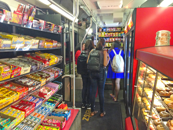 The convenience store, located inside an old bus at the Hughes Metropolitan Complex shuttle stop, has coffee, food, donuts, drinks and other snacks.