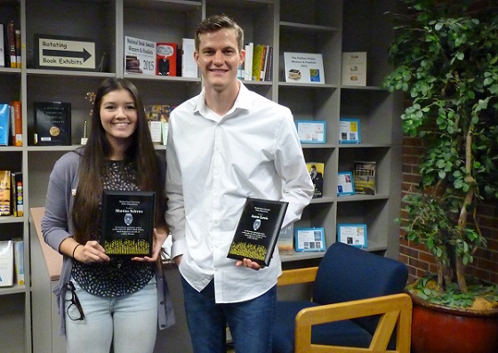 Wichita State students Aaron Lewis and Martina Salerno were honored for their action in saving the life of a fellow student.