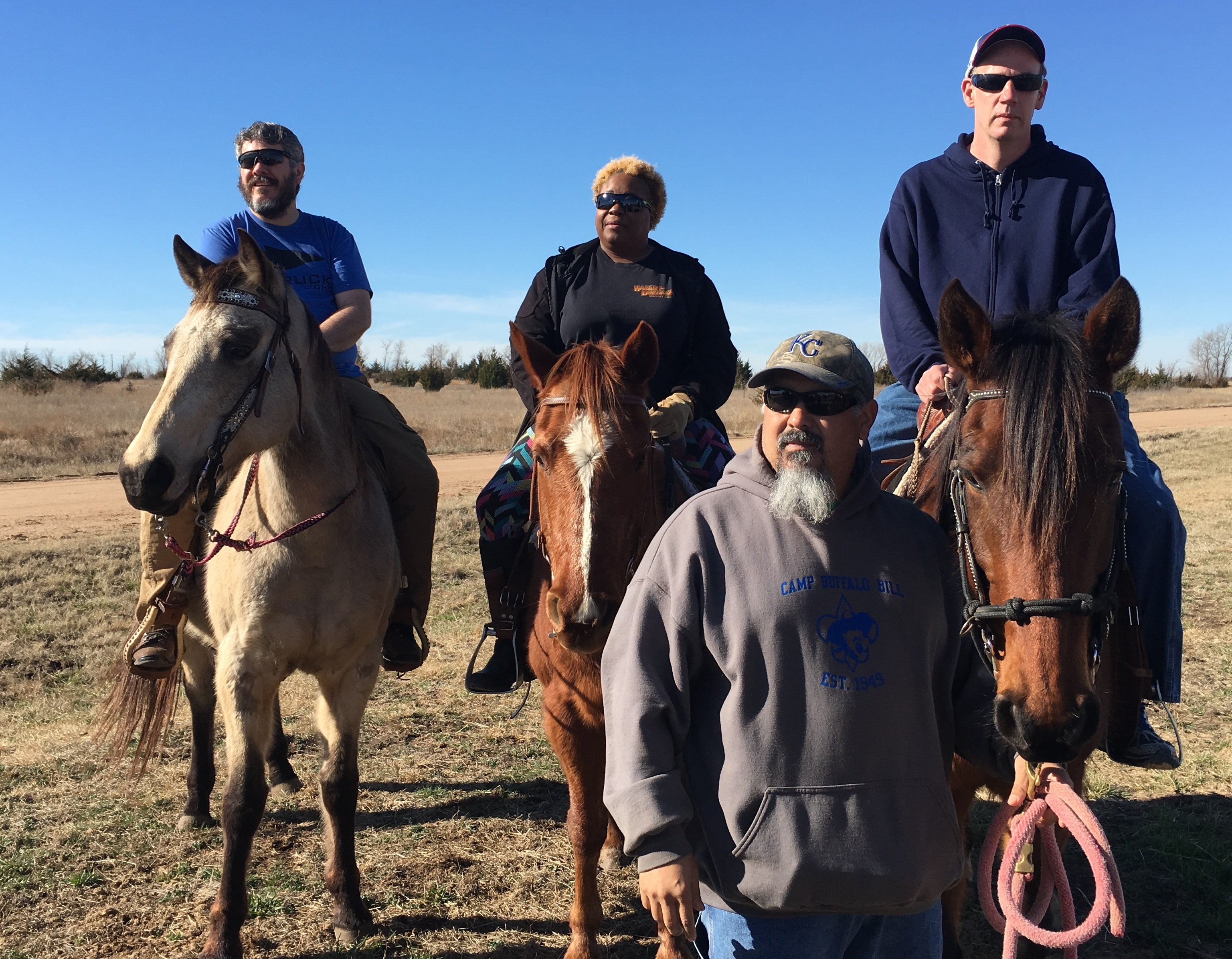 Rick Rangel, foreground, senior social work student at Wichita State University, volunteers at Cloud 9 Therapeutic Equine Foundation for his senior practicum.