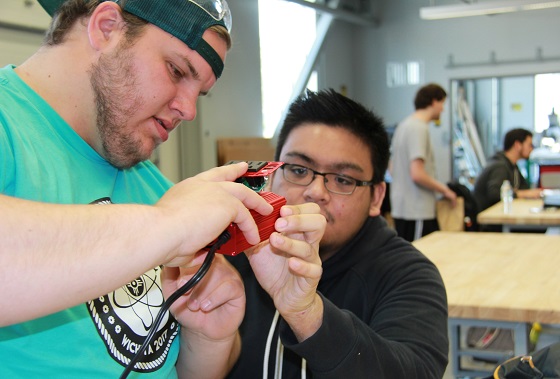 Koch Innovation Challenge winners Michael Lee and Kristian Buan continue work on their design, the Snail Shell Camper.