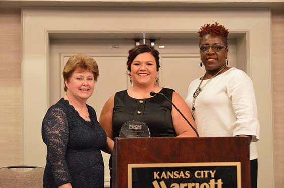 Meladee Garst (middle), psychologist at the Counseling and Testing Center (CTC), was recently awarded the TRIO Achiever award for the tristate chapter.