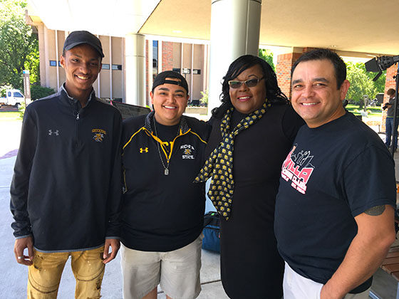 Freshman Tariq Barksdale, left, has relied on the help and guidance of senior Josh Villa, Marche Fleming-Randle and Jacob Villa to attend and succeed in college.