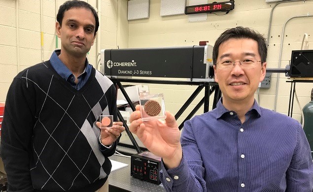 Rajeev Nair (left) and Gisuk Hwang show the manufactured, new capillary structures they are developing for NASA.