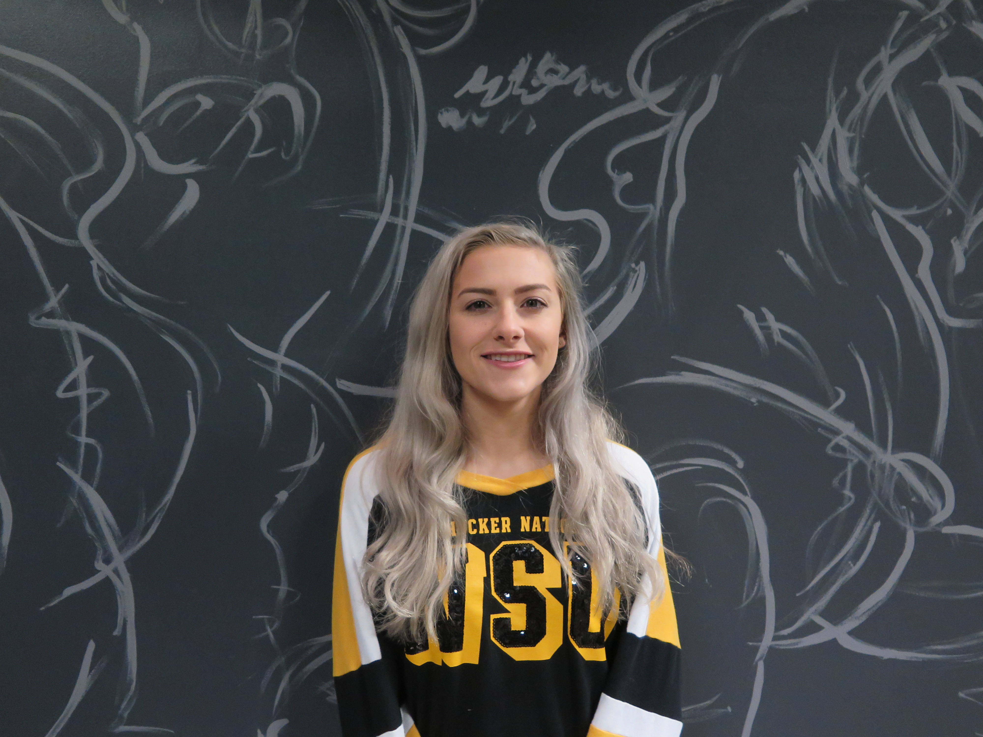 Michaela Marioni is a videogame design student at Wichita State University who got the chance of a lifetime to work on a background video for Snoop Dogg's tour.