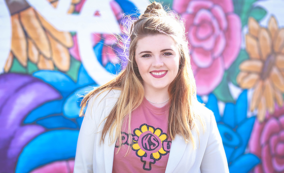 Alyssa Johnson is a recent fine arts graduate who started her own business, Wichita with Love. She creates screen printed graphic tees, buttons, pins, tote bags and her signature accessory, a knotted headband.