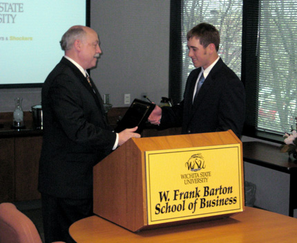 Doug Hensler, dean of WSU's Barton School, congratulates Clint Schulte, one of the recipients of the 2009 Jabara Scholarship in Entrepreneurship.