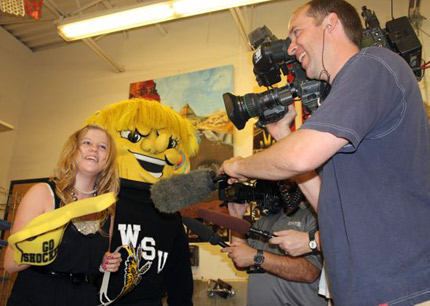 Local news stations came out to Maize High School to cover the surprise announcement of WuShock's 5,000th Facebook friend. The winner was Gabby White, a freshman at Maize.