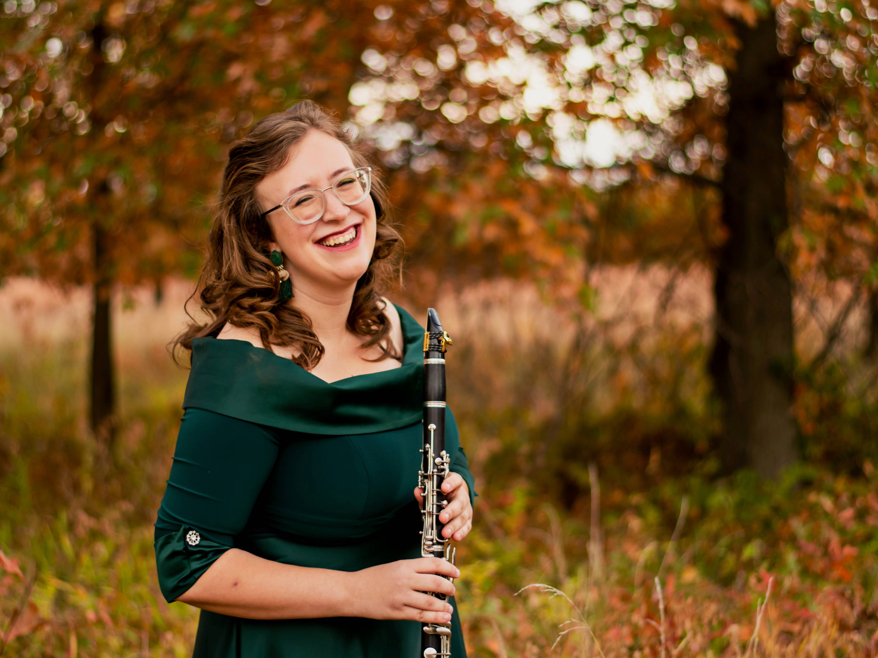 Graduate student Elyssa Astegiano holding her clarinet