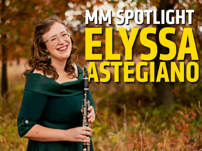 Graduate studnet Elyssa Astegiano holding her clarinet.